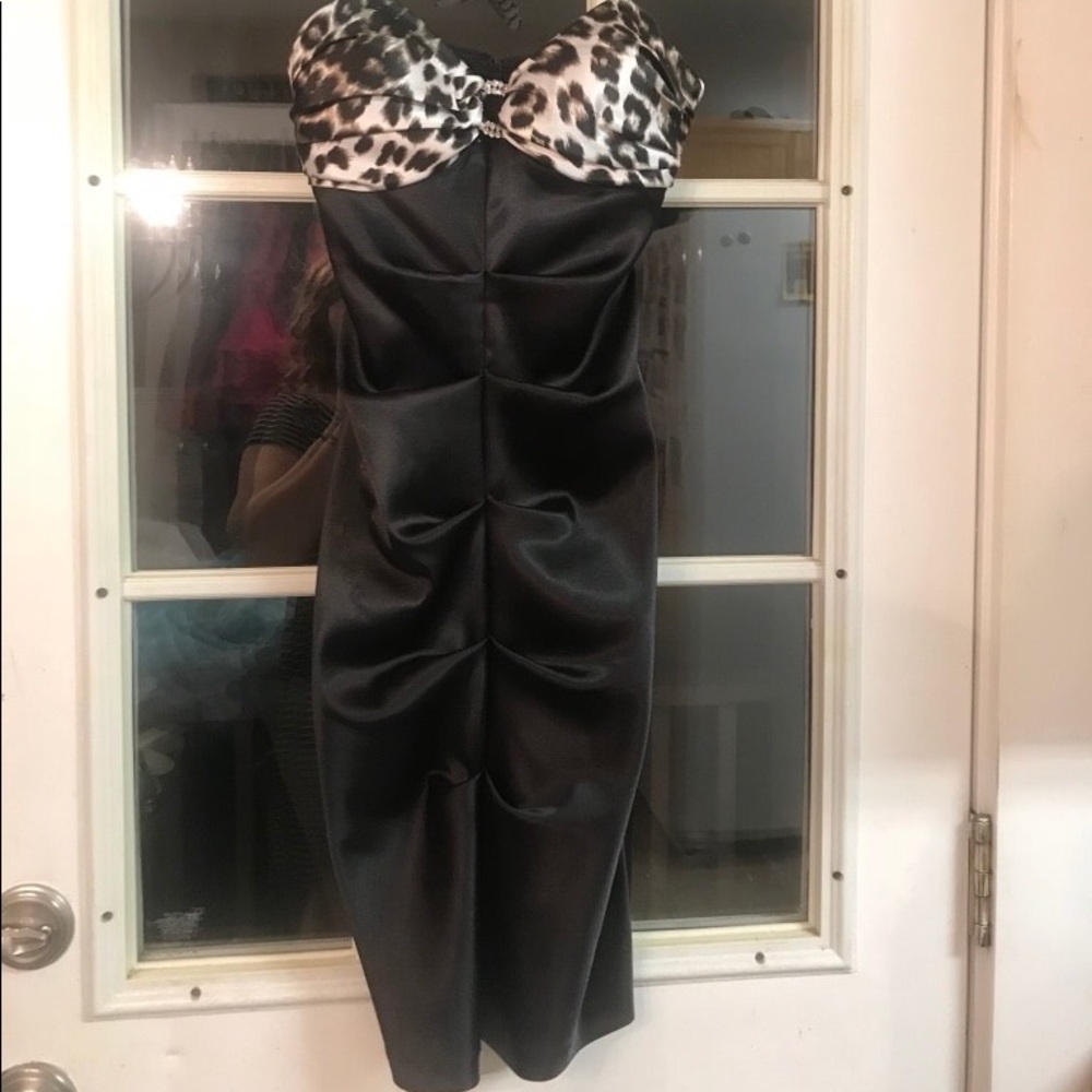 Black and cheetah cocktail or prom dress.